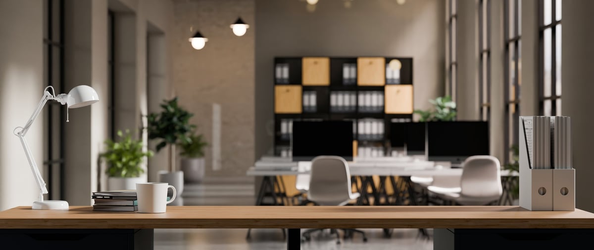 Minimalist workspace with wooden desk